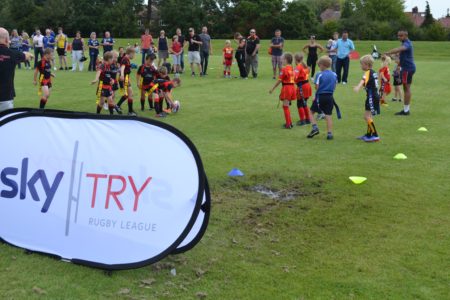 Children playing rugby at Challenge Cup Festival