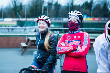 Two girls wearing cycling clothing
