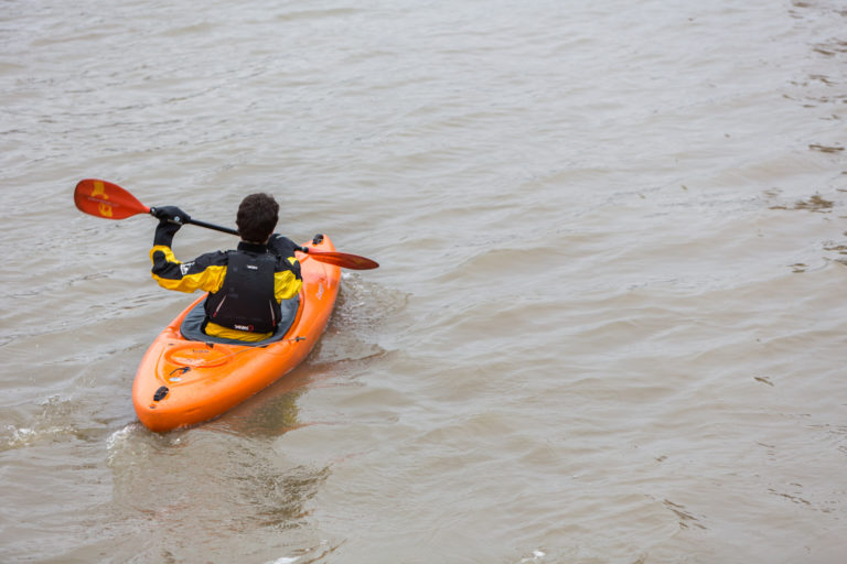 Person rowing in a canoe