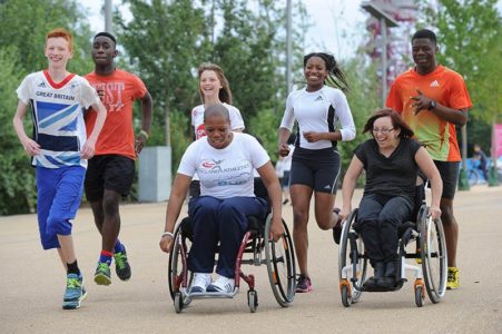 Group of people celebrating diversity at the Olympic Park during World Para Athletics