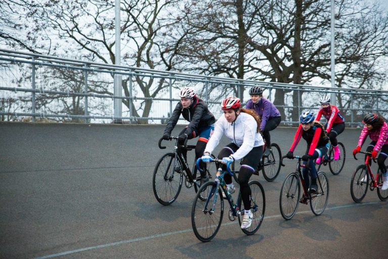 Female cyclists on road track