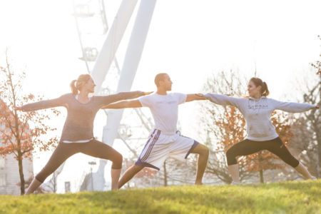 Women doing physical activity near London Eye