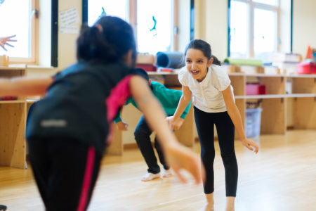Young girls having fun while doing physical activity