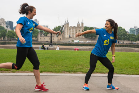 Two female relay runners in I MOVE LONDON Relay kit
